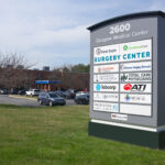 Monument Sign and ADA & Wayfinding Signage Installation in Newark, DE